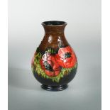 A Moorcroft Anemone pattern flambé vase, of baluster form, painted and impressed marks 18.50cm (7in)