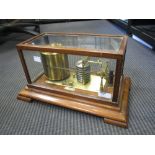 A mahogany cased barograph with Harrods label