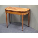 A George III mahogany foldover top table