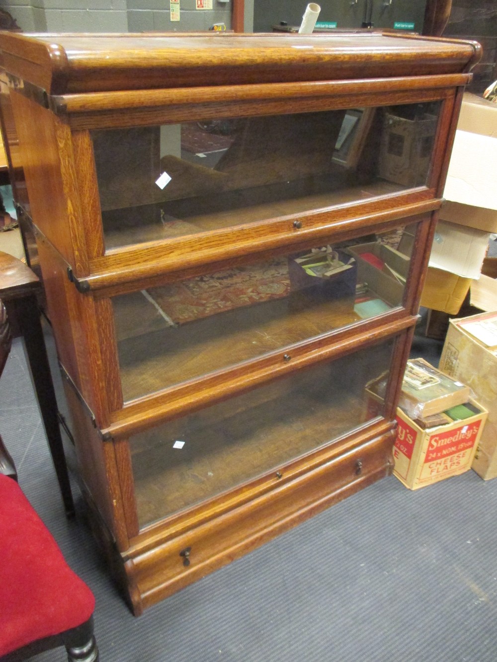 A pair of medium oak Globe Wernicke 3 section stacking bookcases with a drawer to the plinth base - Image 3 of 4