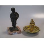 A bronze model of a young boy with violin and a gilt bronze match stiker mounted with a jester