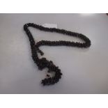 A twisted rope necklace of garnet beads (A/F)
