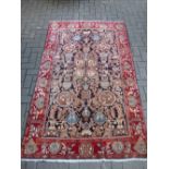 A Meshed rug 212 x 129cm