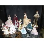 A collection of Royal Worcester, Coalport and other ceramic figures (11)