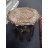 A 19th century Arabic inlaid octogonal table 33cm high