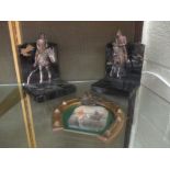 Of racing interest, a pair of silvered metal & onyx bookends, each with a horse & jockey, together
