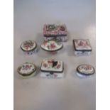 Seven enamelled and decorated small boxes with hinged lids, some damage, 19th century (7)