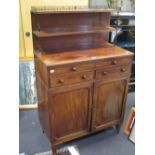 A Regency mahogany chiffonier with two shelf top, on short square legs
