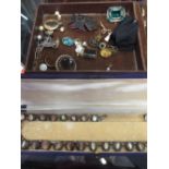 A box of miscellaneous jewellery to include some gold and silver costume, including a tiger's eye