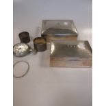 Two silver table cigarette boxes, two napkin rings, a bangle and a pocket watch (6)