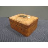 A Victorian walnut sewing box with a silver cigarette case (2)