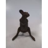 An Edwardian Nestor cast iron nut cracker in the form of a kangaroo, of part textured form with