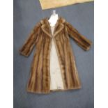 A mid 20th century lady's fur coat