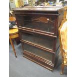 A pair of dark oak Globe Wernicke 3 section stacking bookcases