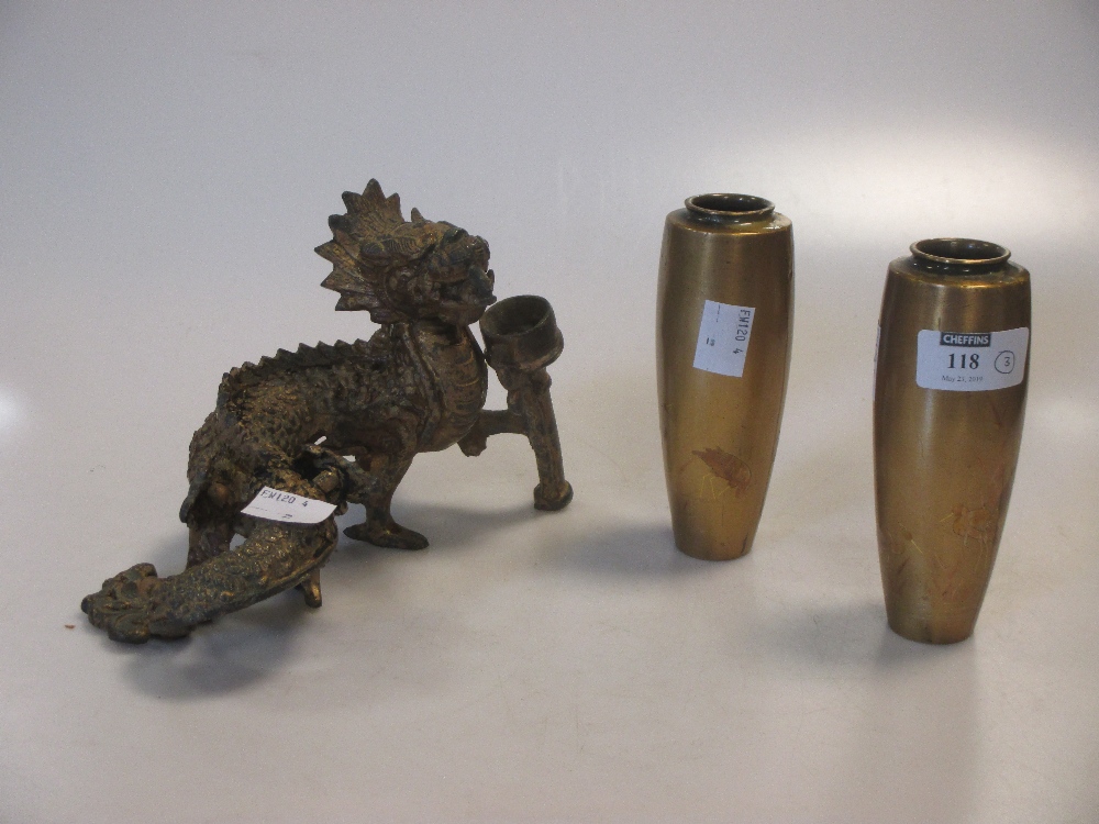 A cast metal dragon candleholder and pair of small lacquered Japanese bronze vases (3)