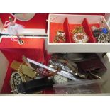 A jewellery box containing a lady's 9ct gold bracelet watch and a 9ct gold chain 15.1g gross (ex