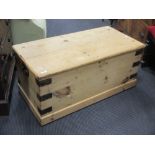 A small stripped pine blanket box with hinged lid and metalwork accents, 40 x 90 x 44cm together