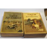 Tin Tin a Madagascar and Tin Tin au Congo - two wooden illustrated wooden boxes (2)