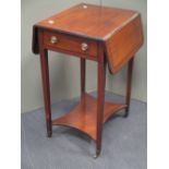 A small Regency mahogany and ebony strung Pembroke table, with concave sided under tier, 73cm high