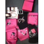 A collection of 9 necklaces cased by 'Pia', together with two pairs of earrings from the 'Charles