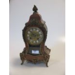 A French Boulle case mantel clock, brass inlaid, later finial, few cracks and losses to the inlay