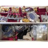 A jewellery box containing a large collection of costume jewellery together with some silver items