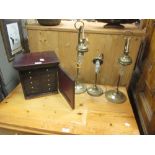 Three brass table lamps and a small cabinet (4)