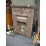 A late Victorian cast iron bedroom fire surround