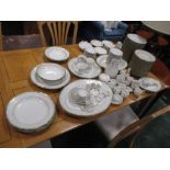 A large dinner service made in Berlin consisting of 58 Dinner plates, 11 Soup plates, 1 soup