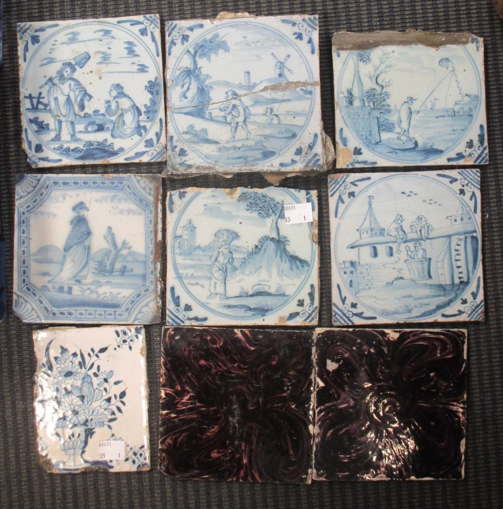Fourteen 18th century Delft tiles, decorated in manganese with religious and pastoral scenes; a