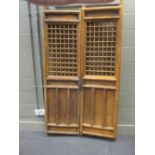 A pair of oriental doors hinged doors each door 183 x 55cm excluding hinge
