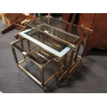 Three graduated brass framed occasional tables (3)