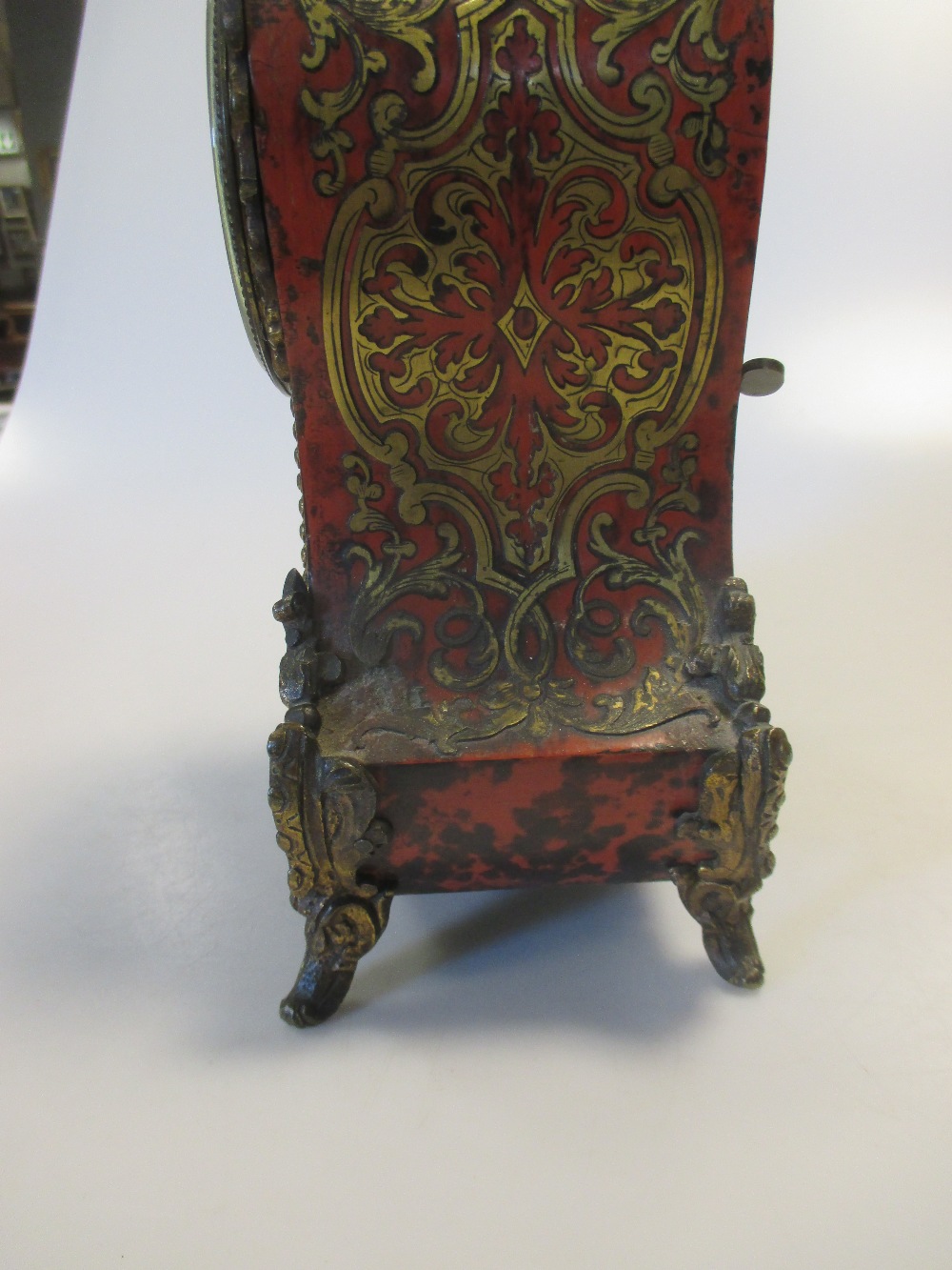 A French Boulle case mantel clock, brass inlaid, later finial, few cracks and losses to the inlay - Image 2 of 4