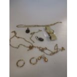Four 9ct chains, 3 pairs of earrings (10.4g) and a 9ct gentleman's Accurist watch on a gold plated