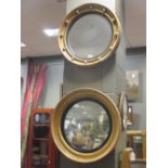 Two gilt framed circular mirrors, 52cm and 52cm (2)