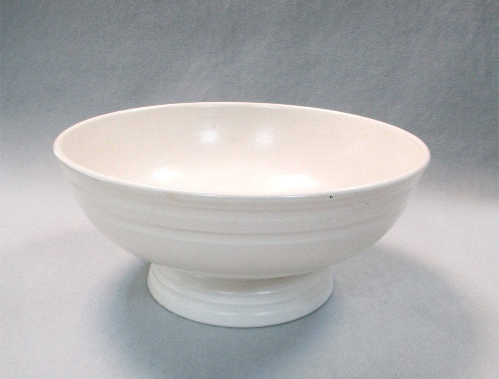 Keith Murray for Wedgwood, a moonstone footed bowl, of circular form with horizontal banding,