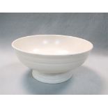 Keith Murray for Wedgwood, a moonstone footed bowl, of circular form with horizontal banding,