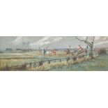 Frank Algernon Stewart (British, 1877-1945) The South Durham Hunt running towards Aycliffe from a