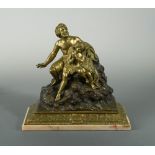 After the Antique, a French patinated and gilt bronze figure, modelled as a man and child upon a