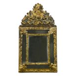 A pair of Dutch gilt brass wall mirrors, with cushion bevelled plates below arched cresting 58 x