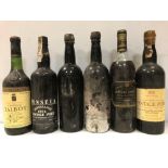 Four vintage ports and two Bordeaux wines. Chateau Talbot, St Julien 1975; Chateau Guiraud,