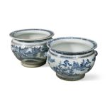 A near pair of large 19th century Chinese blue and white jardinieres, with lion mask handles, 43 x