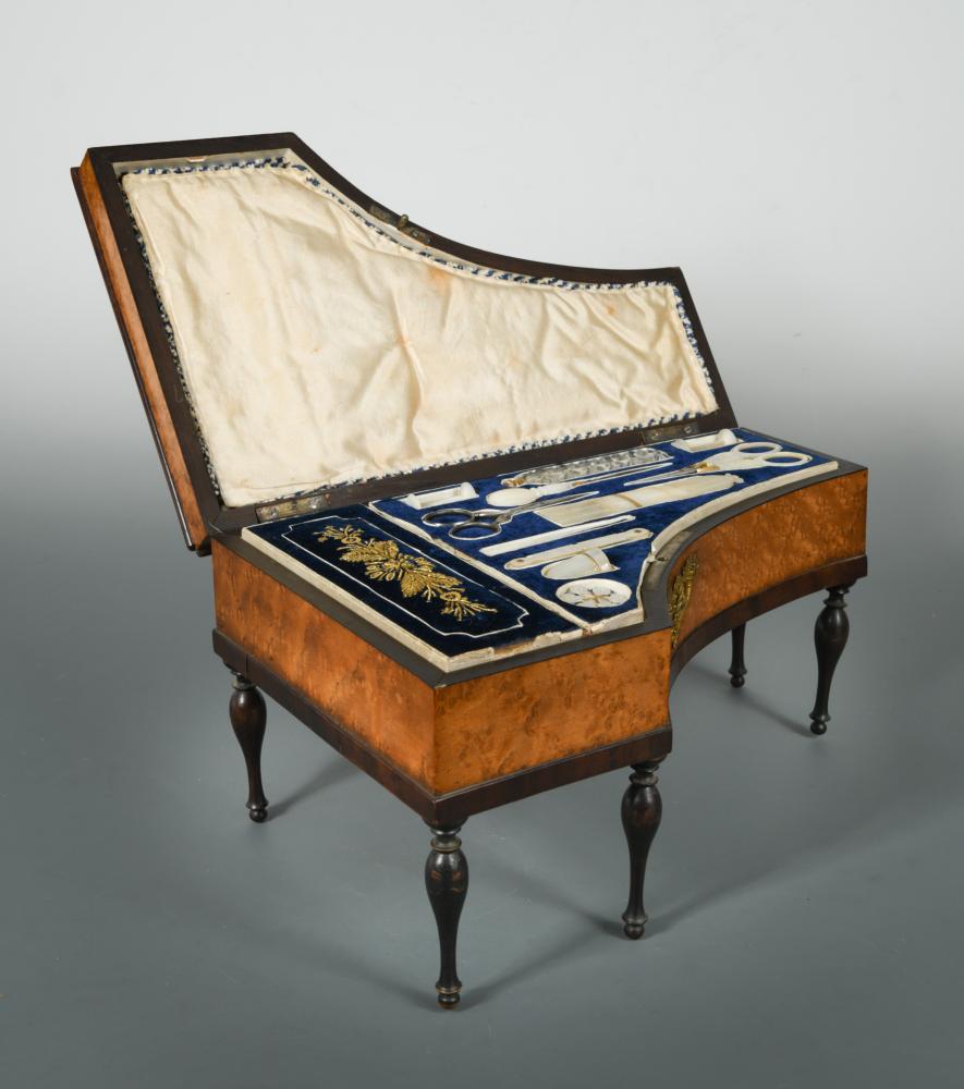 A late 19th century French birdseye maple Palais Royale type sewing box in the form of a