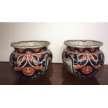 A pair of porcelain imari palette circular jardinieres, circa 1900, traditionally decorated (2) 29cm