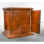 A William IV mahogany collector's cabinet, with two doors enclosing fifteen drawers with flush