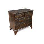 An early 18th century black japanned chest, of two short and two long drawers, decorated with