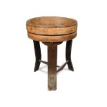A late 18th/ early 19th century circular coopered oak bin with beech bands, no triple support with