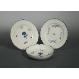 A pair of Chantilly porcelain blue and white plates, circa 1750, decorated to the centre with