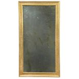 A George III style gilt framed wall mirror, 20th century, fluted frame with corner florets 82 x