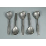 A set of five pewter spoons, with shaped rectangular handles and pear shaped bowl, the reverse